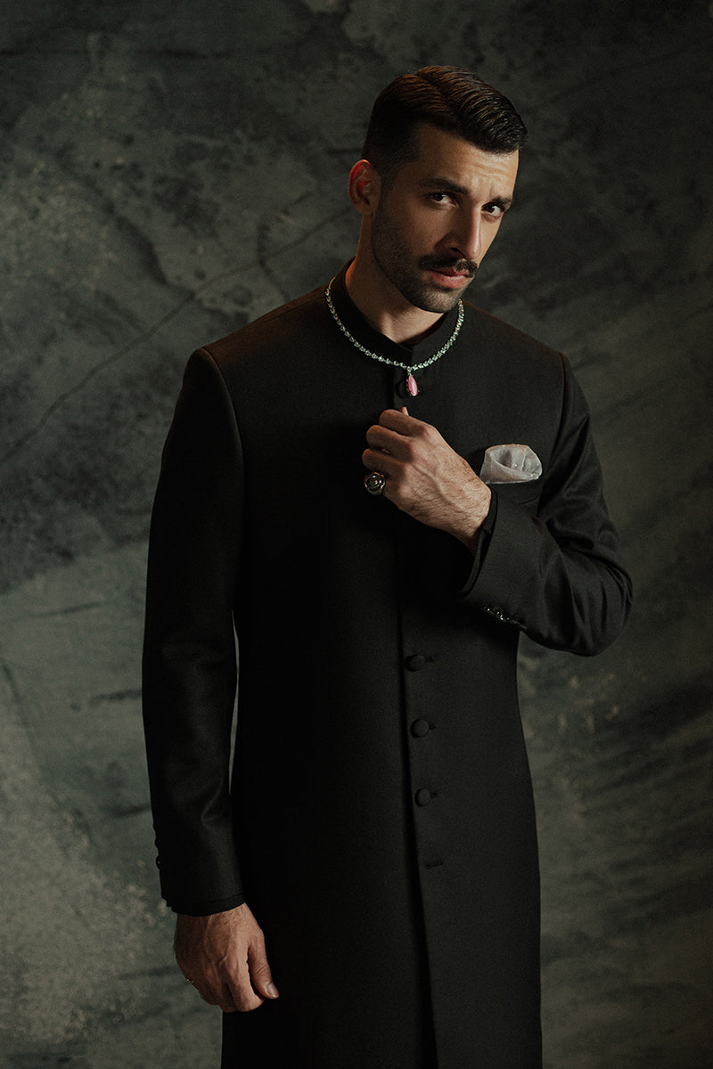 Elegant black sherwani for Indian weddings, designed for a royal look