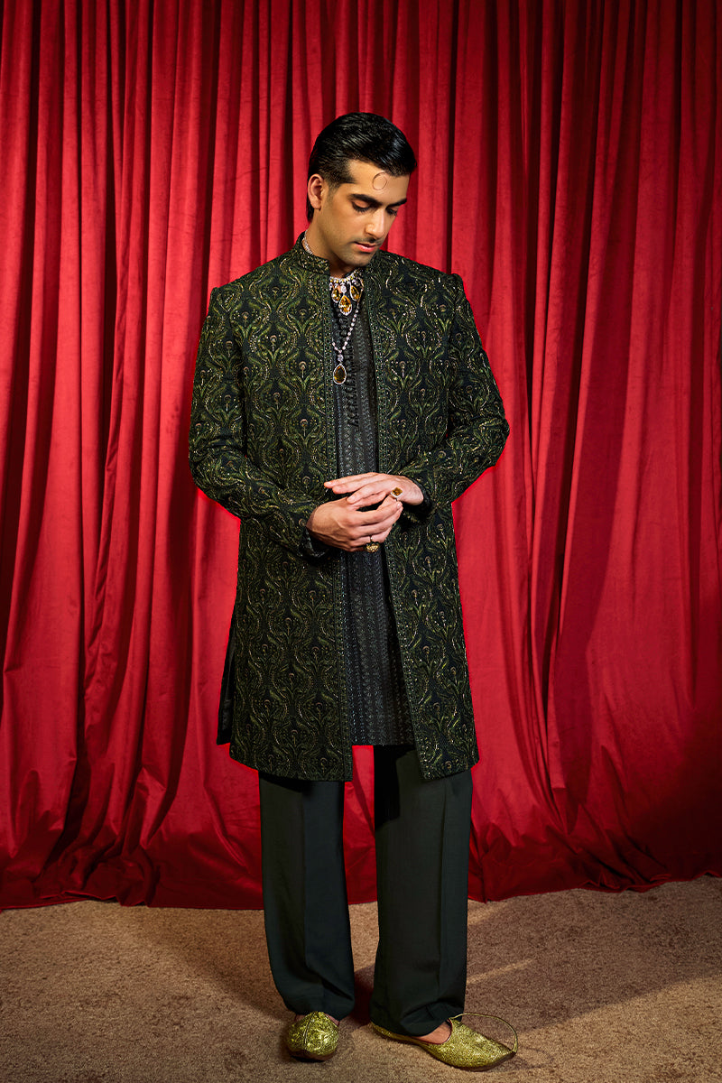Shop designer embroidered green sherwani for groom with intricate gold detailing, available for online purchase. Perfect traditional attire for weddings and special occasions.