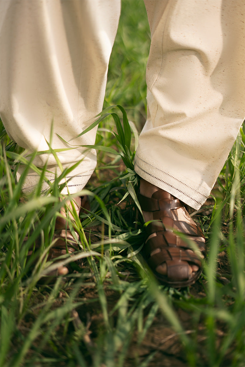 Men's shalwar kameez design in boski material, blending tradition and style effortlessly.