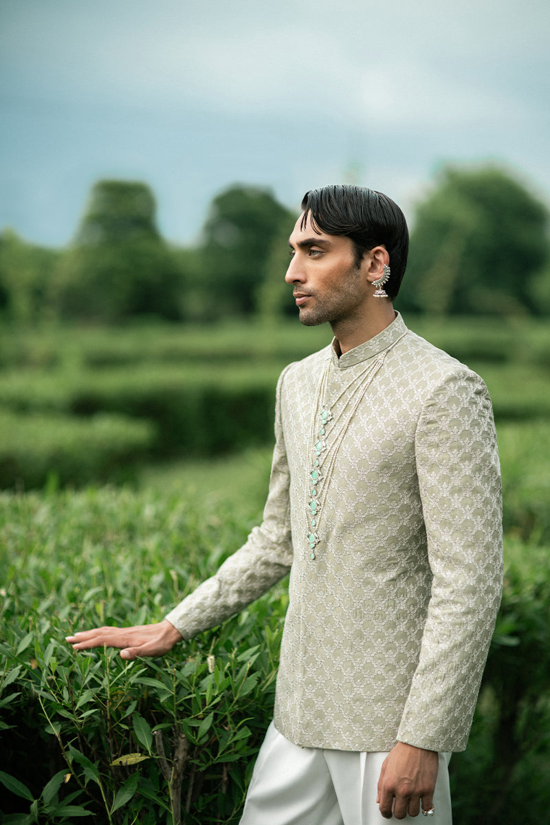 Wedding-ready green prince coat for groom with a luxurious and elegant design