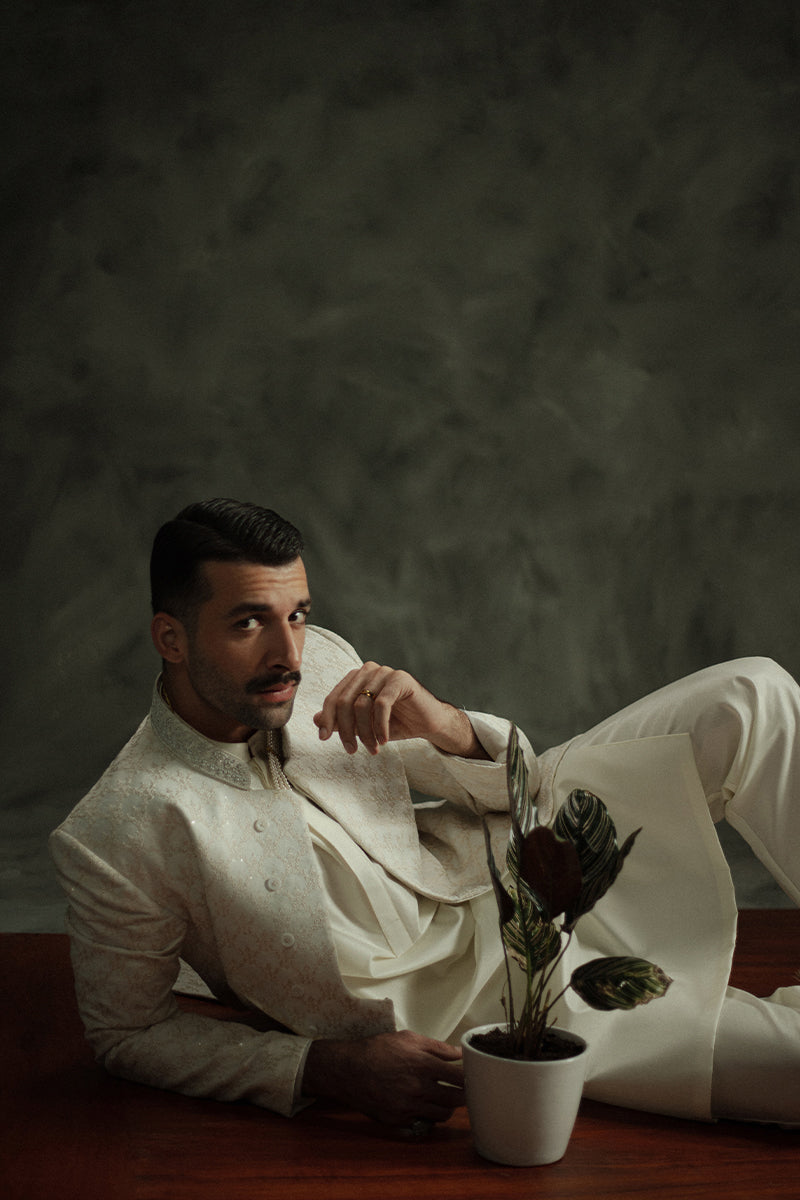 Ivory groom sherwani with modern yet elegant styling