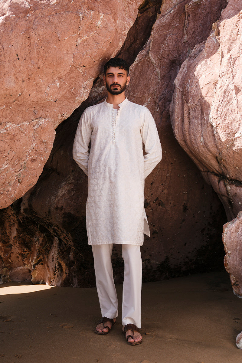 Elegant Ivory White Embroidered Kurta Pajama for men with intricate design.