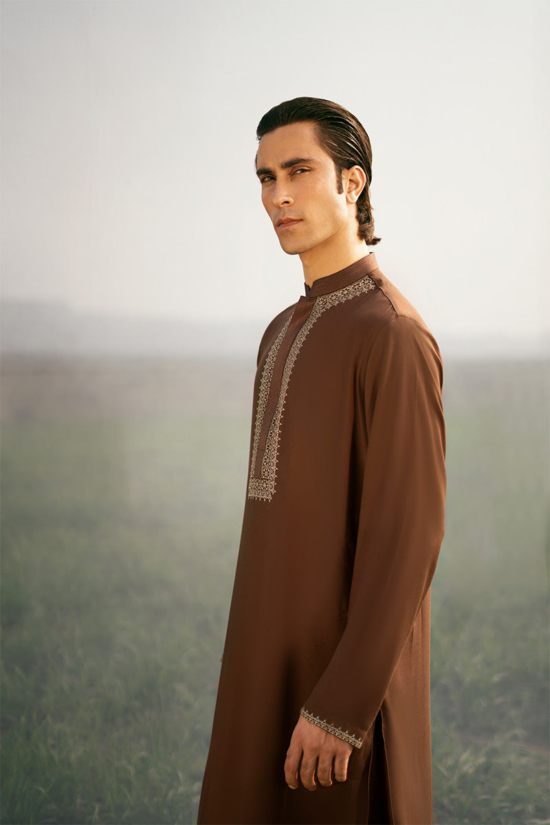 Men's designer kurta pajama in a sleek brown tone, with a distinctive kurta design that balances modern and traditional aesthetics.