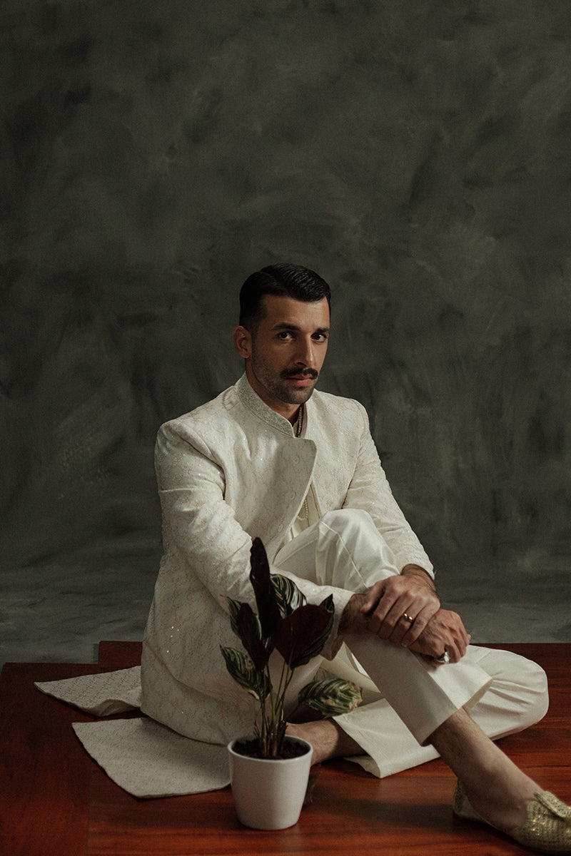 Modern wedding sherwani in white for stylish grooms