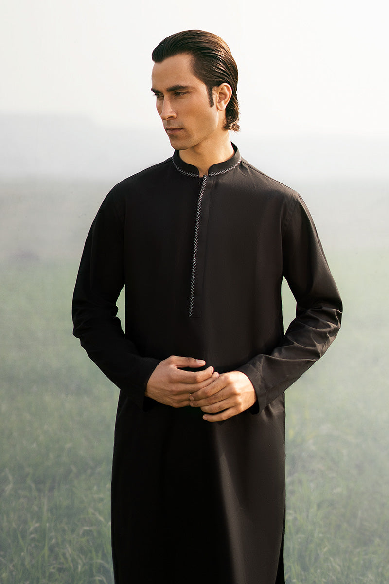 Premium black kurta pajama paired with a plum waistcoat, offering an elegant kurta design for special events.