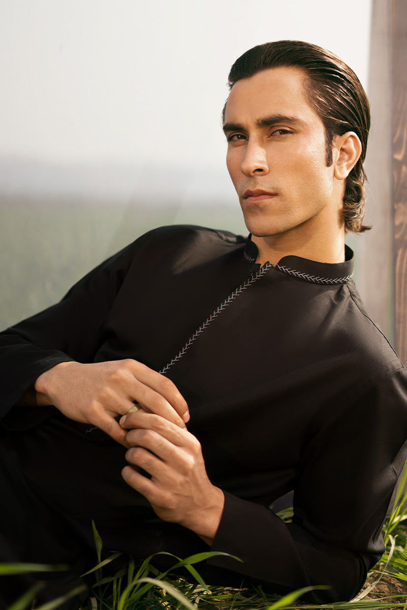 Stylish black kurta pajama showcasing the latest kurta design trends for men, ideal for festive celebrations
