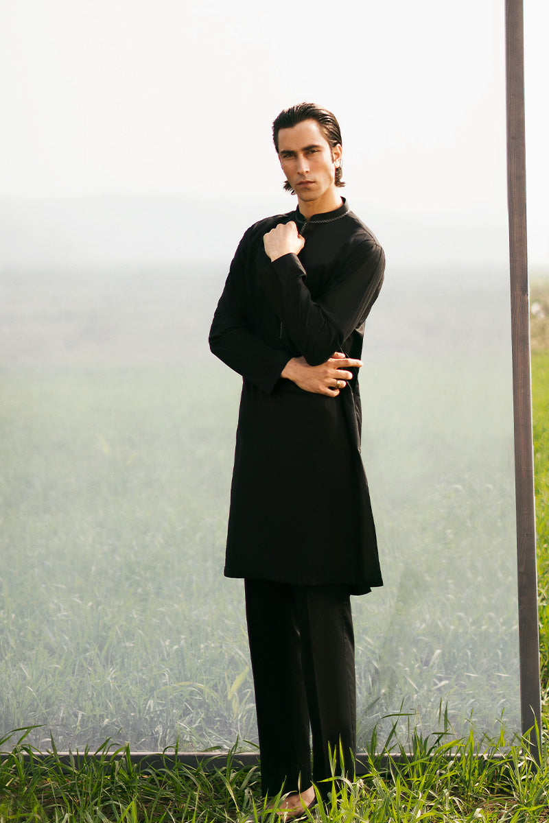 Refined black kurta pajama for men, blending traditional and contemporary kurta designs seamlessly.