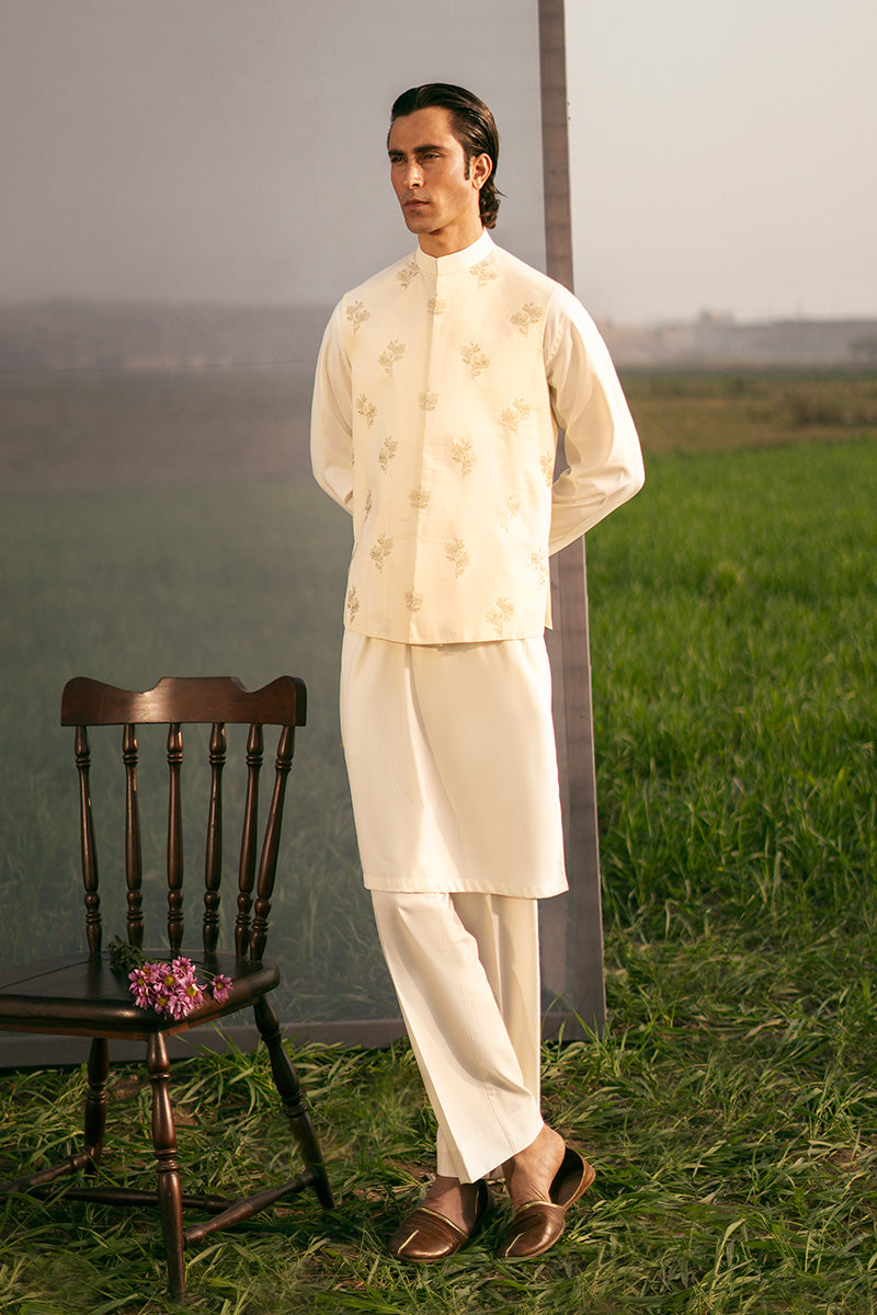 Classic blue waistcoat design for men, inspired by traditional Pakistani fashion trends.